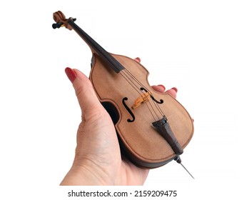 Wooden Miniature Double Bass in a female palm. Mini Contrabass Replica, Mini Musical Instrument. Model Home Decoration