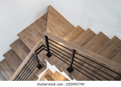 wooden modern stairs and railing