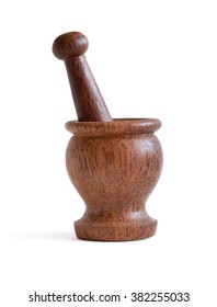 Wooden Mortar With Pestle On A White Background