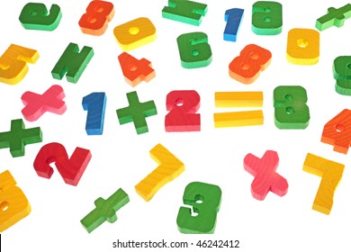 Wooden multi-coloured figures for training of children to the mathematician