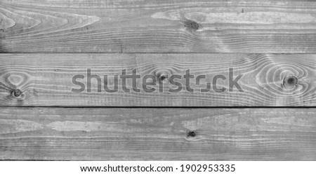 wooden natural background from several layers, wooden texture, gray color close-up