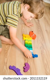 Wooden Number Puzzle. Implement For Children To Develop Fine Motoric Skills, Logical Thinking Through Play. Toy To Learn Counting And Stimulate Imagination, Creativity, Hand - Eye Coordination.