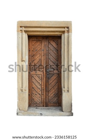wooden old door with carved stone framing, isolated on white background