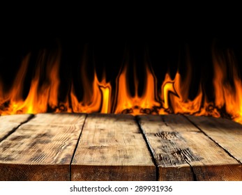 Wooden Old Table Shadows And Fire Place 