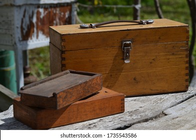 wooden old tool boxes or for different gizmos. one large drawer with handle and lock and two drawer cases - Shutterstock ID 1735543586
