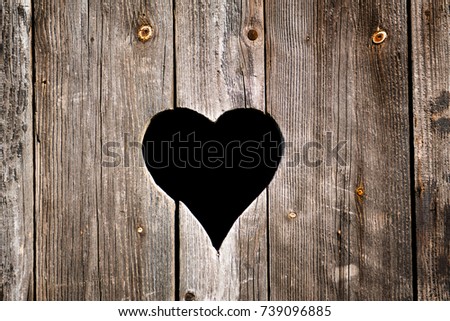 Wooden outdoor toilet with heart on the door. ストックフォト © 