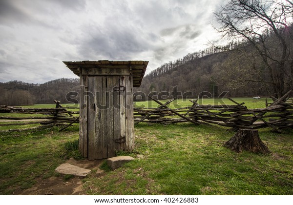 Wooden Outhouse In\
The Smoky Mountains. Wooden outhouse on display in the Great Smoky\
Mountains National Park.