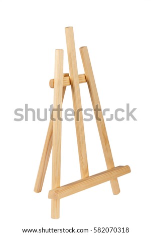 Wooden painter easel isolated on white. academy tripod.