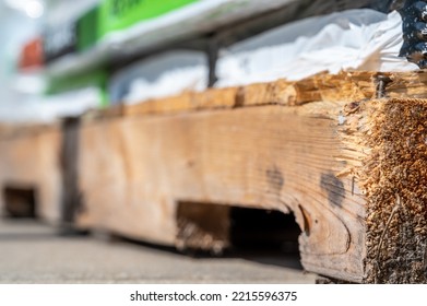 Wooden Pallet With Chipped Board And Exposed Nail.