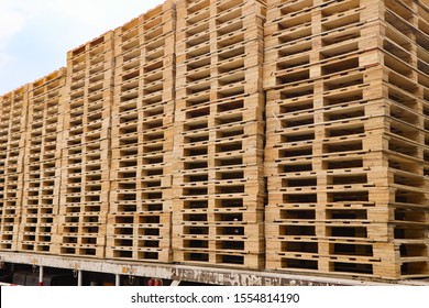 Wooden pallets stack at the freight cargo warehouse for transportation and logistics industrial