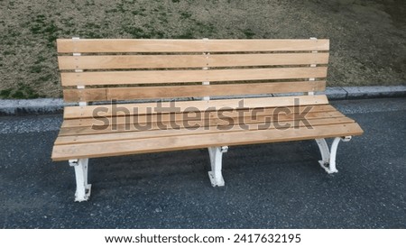 wooden park benches along city parks