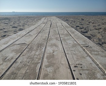 Wooden Pathway On Sand Leading To The Adriatic Sea In Durres Beach Albania, Winter Season