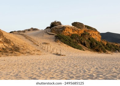 Wooden Pathway in Sandy Coastal Landscape - Powered by Shutterstock