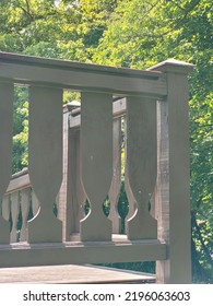 Wooden Patio Deck Corner In The Summer.  Trees And Shade.