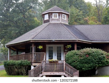 Wooden Pavilion With Wrap Around Porch And Staircase In New Jersey