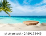 Wooden pedestal with free space for your decoration on tropical summer sand beach