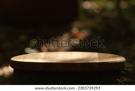 wooden pedestal, stage for product placement, dark background.