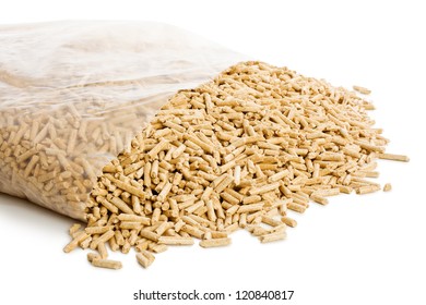 wooden pellets in plastic bag on white background