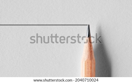 Wooden pencil draws a straight line. Stability or stagnancy concept in business market.