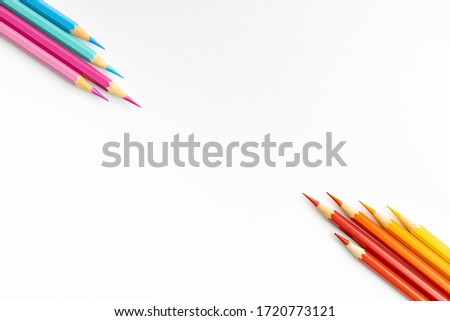 Wooden pencils of different colours as banner concept of work from home with copy space for runaround or wraparound text.WFH concept.