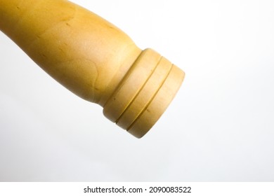 
Wooden Pepper Grinder With White Background.