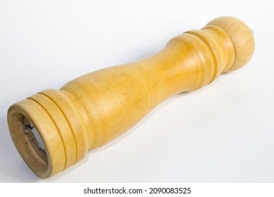 
Wooden Pepper Grinder With White Background.