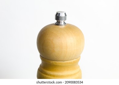 
Wooden Pepper Grinder With White Background.