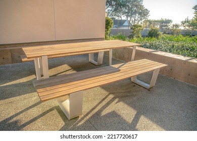 Wooden Picnic Table With Bench At A House In Del Mar Southern California. Outdoor Furniture At A Patio Of A Home In A Seaside Neighborhood Viewed On A Sunny Day.