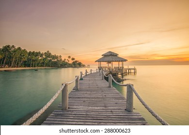 Wooden pier between sunset in Phuket, Thailand. Landscape and travel, or nature and sightseeing in summer concept - Powered by Shutterstock