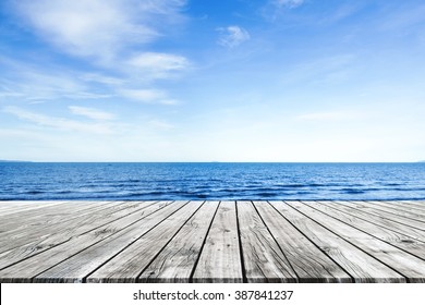 Wooden pier with blue sea and sky background - Powered by Shutterstock