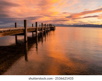 Wooden Pier and Clouds Reflecting on Lake Tahoe at Sunrise, South Lake Tahoe, California, USA - Powered by Shutterstock