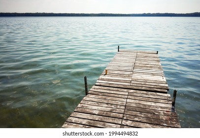 Wooden Pier At Drawsko Lake, Maximum Depth Of 80 M Makes It The Second Deepest Lake In Poland.