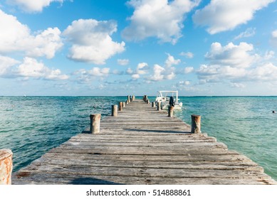 Wooden Pier Looking Out The Mayan Riviera