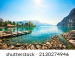 Wooden pier on the lake. Riva del Garda, Trentino, Italy, Europe.