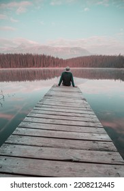 Wooden Pier In Serenity Mountains Lake