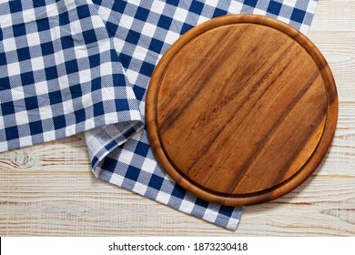 Wooden pizza board mockup top view on table copy space - Powered by Shutterstock