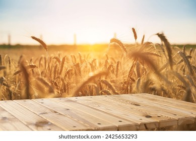 Wooden Plank Empty Table For Products Display With Blurred Wheat Field and Blue Sky Background. High quality photo - Powered by Shutterstock