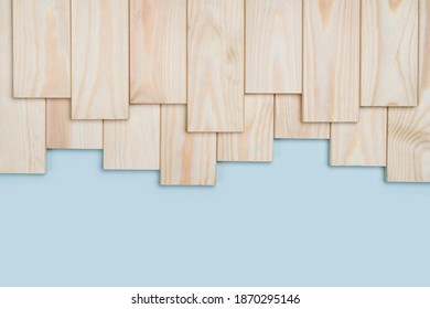 Wooden planks on blue background with copy space at bottom