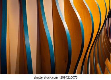 Wooden planks in similar shapes forming a pattern of waves into visual perspective making association with harmony