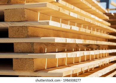 Wooden planks. Stack of wood for air drying. Air drying of wood
