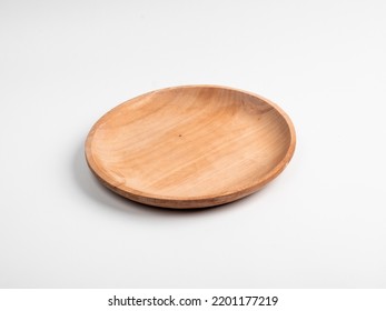 Wooden Plate isolated on white background with a 45 degree angle setup