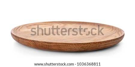 Wooden plate on white background. Handcrafted cooking utensils