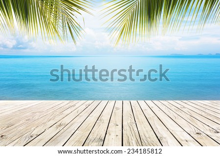 Wooden platform beside tropical sea