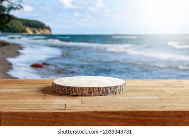 Wooden platform on the table for standing product against the background of the autumn sea landscape with the midday sun  - Shutterstock ID 2033343731