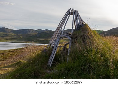 Wooden Poles For Sami Traditional Shelter In Tundra, Skarsvag, Northern Norway