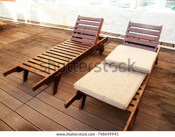 Wooden Pool Lounge Chairs On Deck Stock Photo Edit Now 748649941