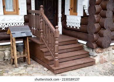 Wooden Porch With Steps And A Door To A Log Cabin. Village Houses Architecture