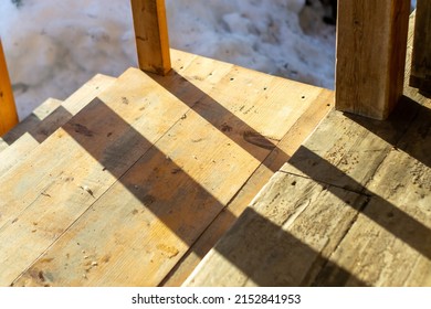 Wooden Porch Of A Village House With Shadows