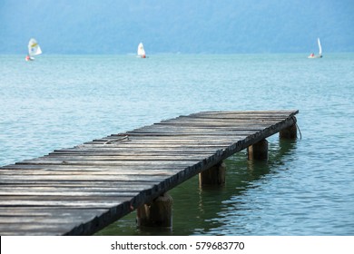 Wooden Port And Sailing Boats