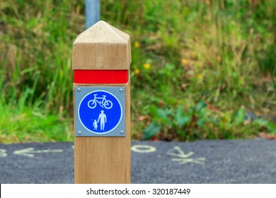 Wooden Post Marking Pedestrian And Cycle Path Sign